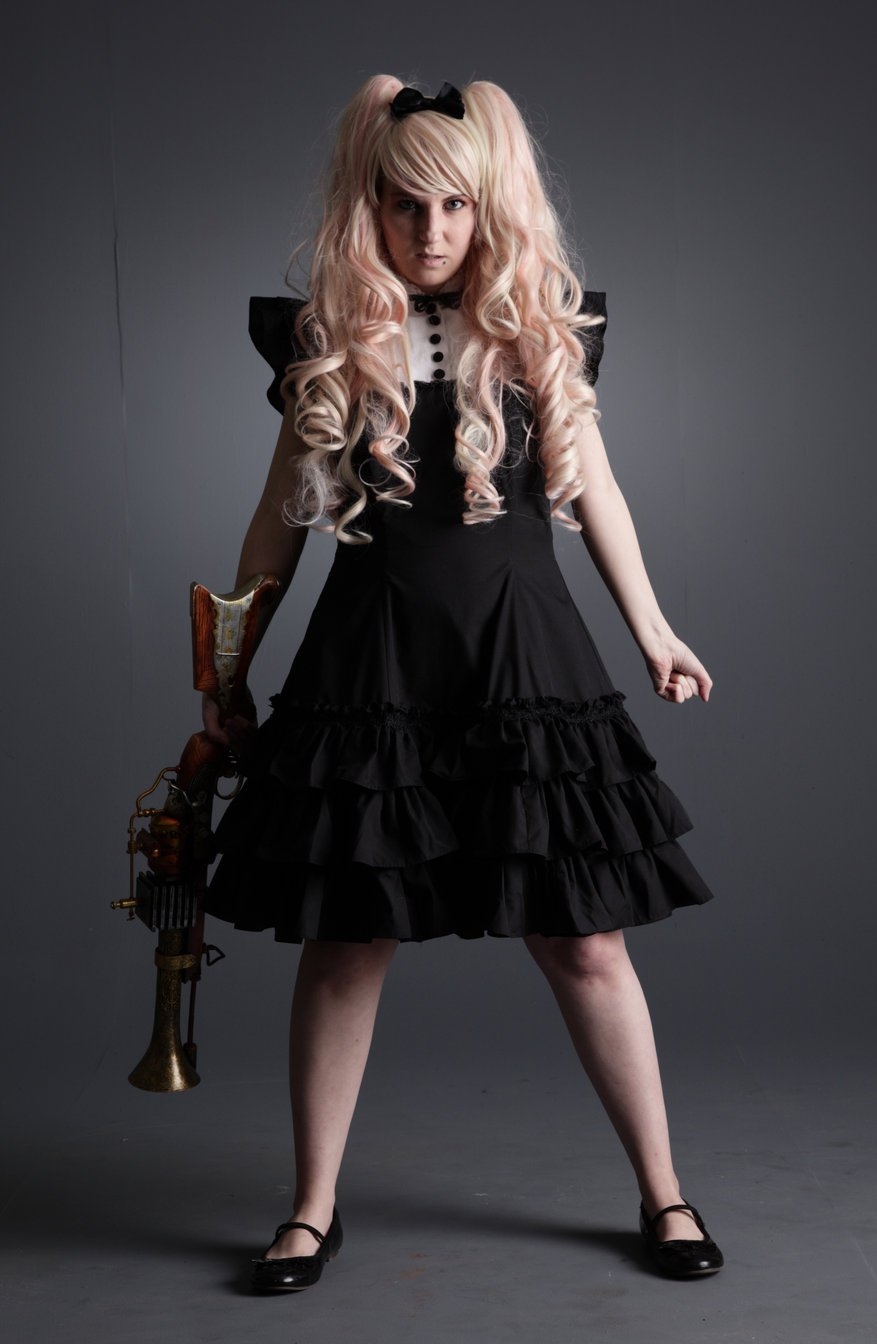 Blonde Lolita with Bare Legs wearing Black Dress and Black Shoes